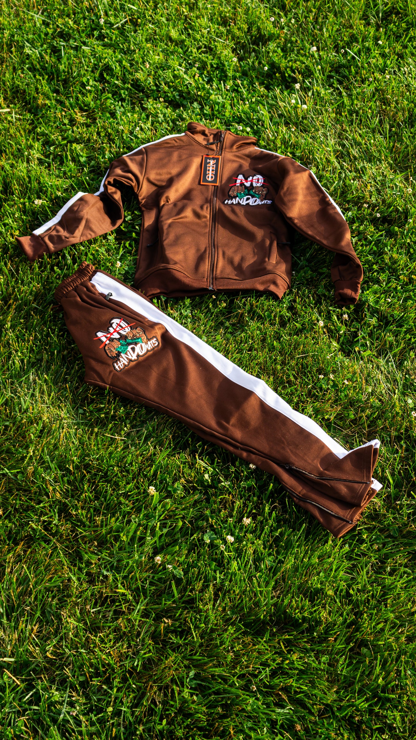 “NoHandOuts” Track Suits