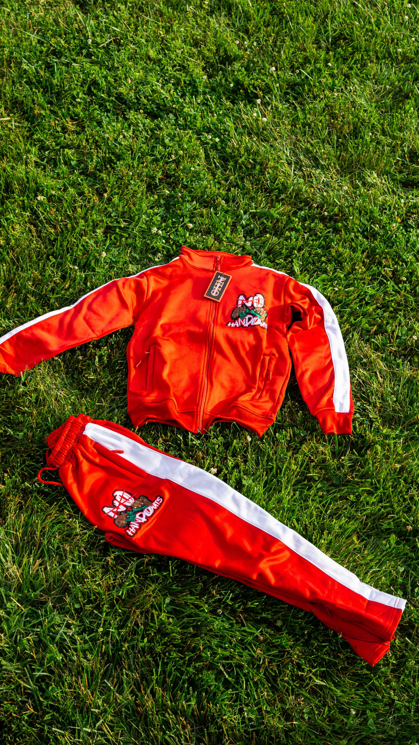 “NoHandOuts” Track Suits