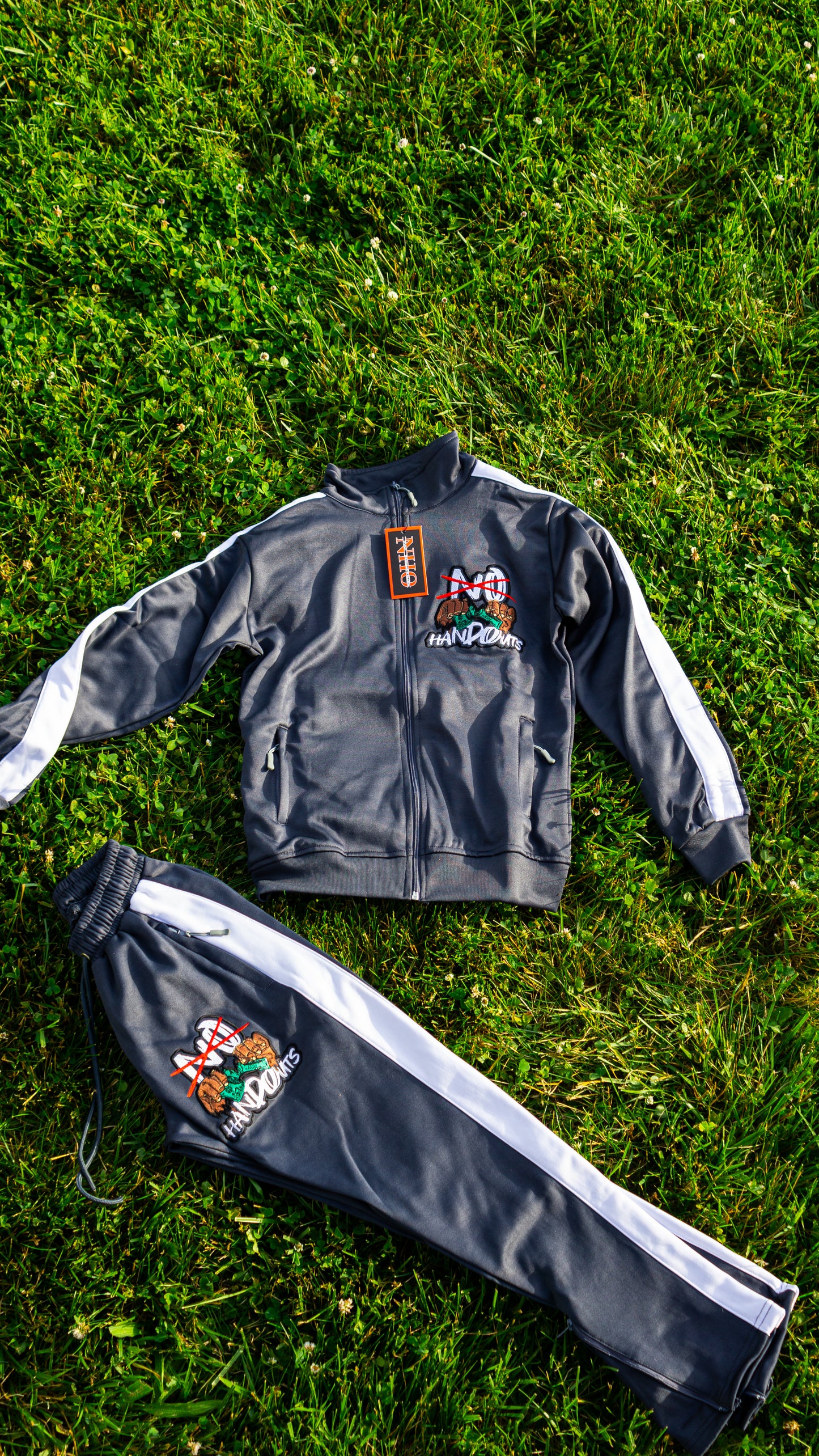 “NoHandOuts” Track Suits